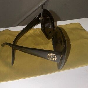 Gucci Black Sunglasses with Gold Emblem